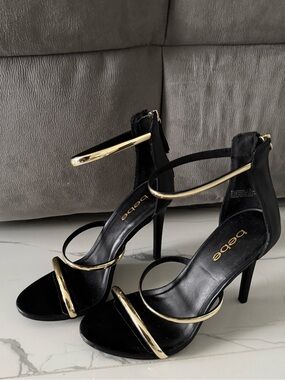 bebe Black and Gold High Heel Sandals